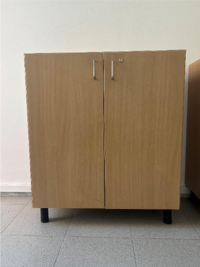A wooden cabinet with a handle
AI-generated content may be incorrect.
