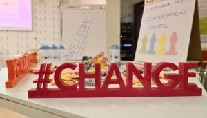 A 3d Change sign on a desk at an ETF ENE meeting