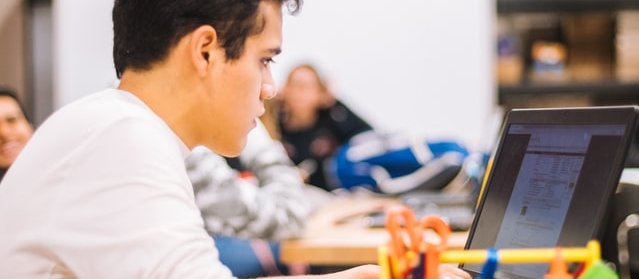 student in front of computer